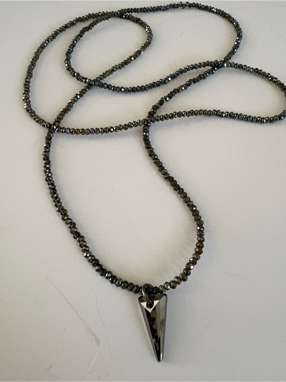 Hematite Faceted layer Bead Necklace with Hematite Spike Pendant